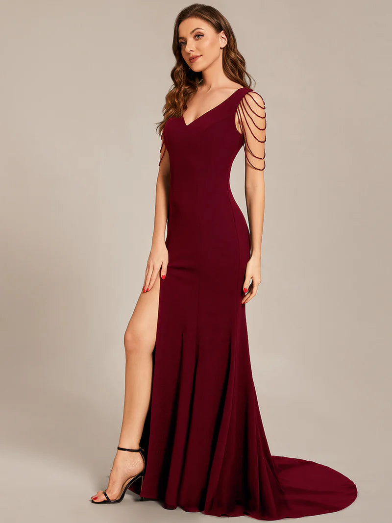 Burgundy red sleeveless beaded v neck mermaid tail formal dress. Graceful Elegance Bridal Shop services Logan, Brisbane, Gold Coast, Scenic Rim.